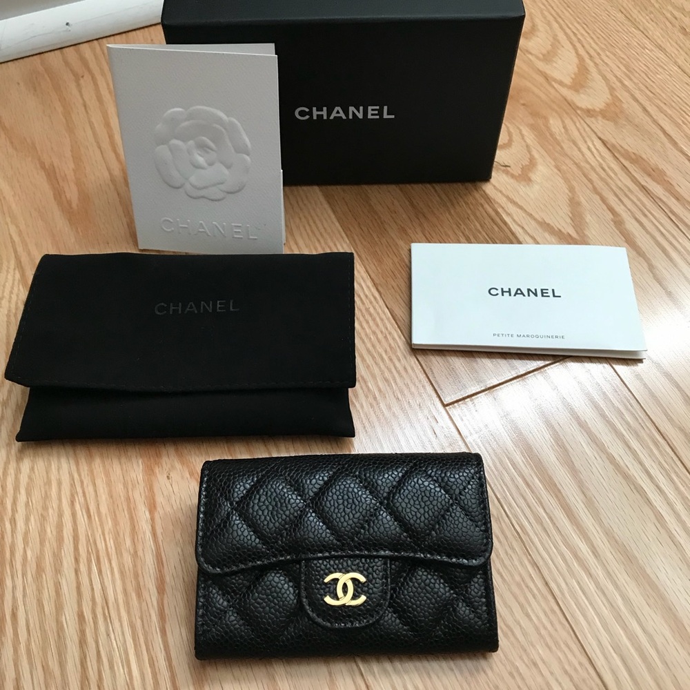 CHANEL Black Quilted Card Holder with Gold Logo